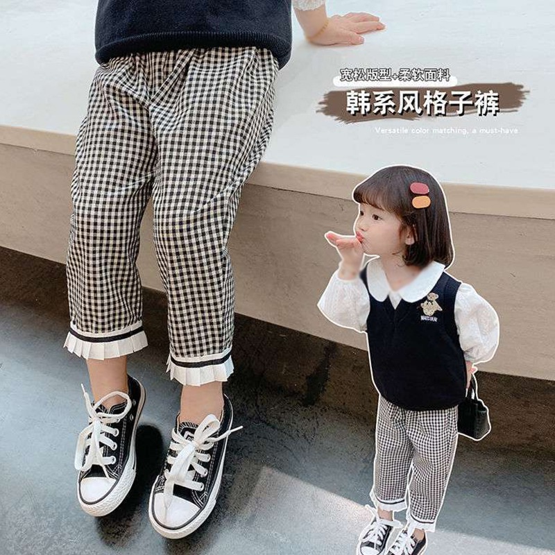 Quần dài vải mềm họa tiết ca rô trắng đen thời trang thoải mái cho bé