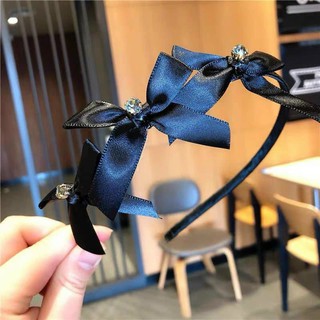 cài nơ xinh xắn màu đen
