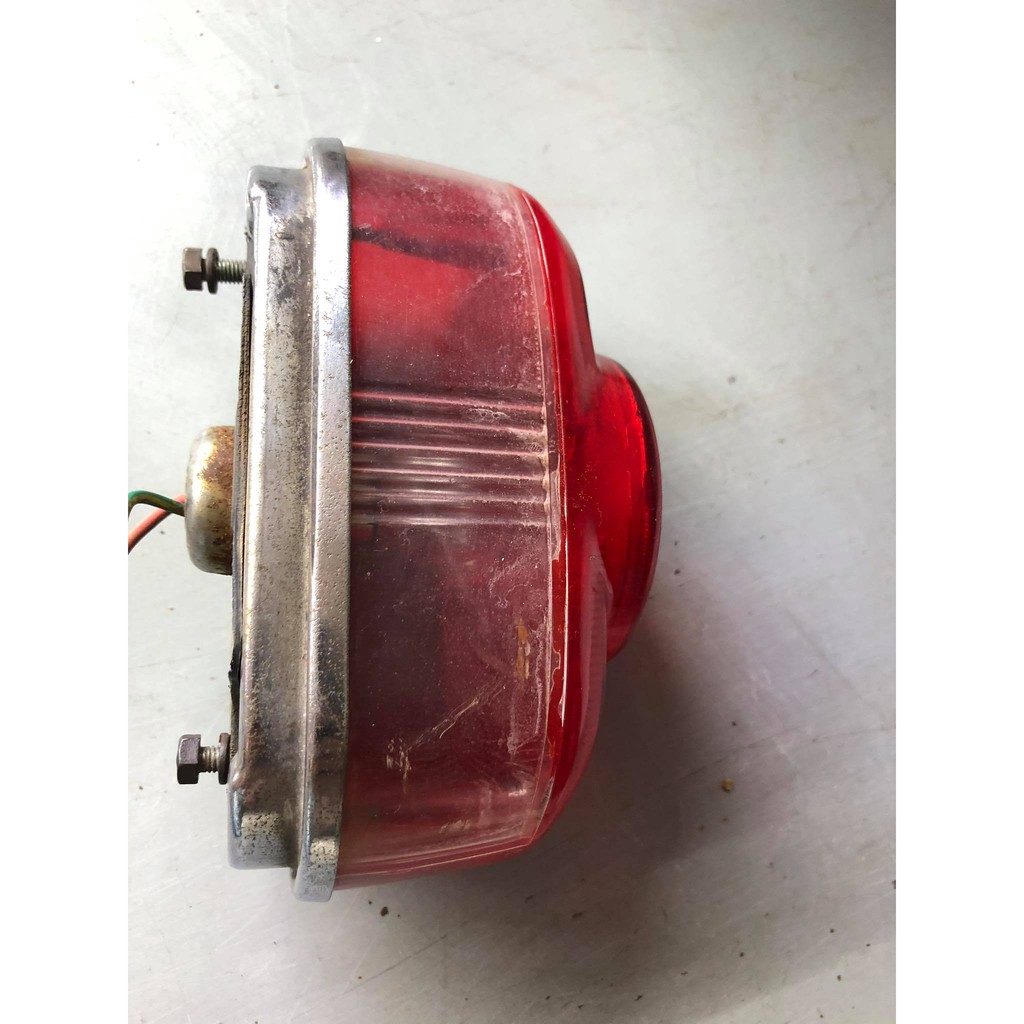 Đế chụp đèn láy  đồng tiền giữa cho xe 68-72-dame-cub. Hàng rã xe 72 zin