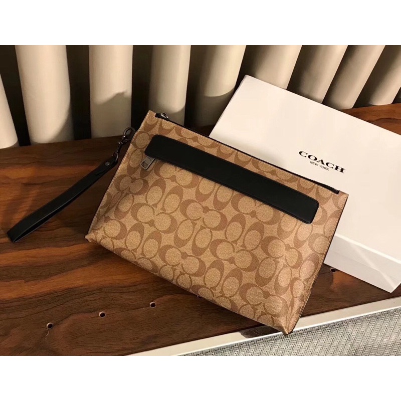 Clutch cầm tay cho nam thương hiệu Coach da thật cao cấp