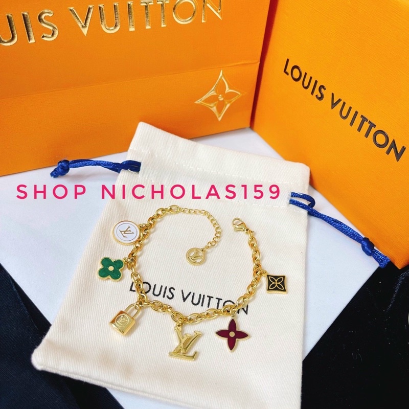 Lắv tay titan lv mạ vàng ko đen