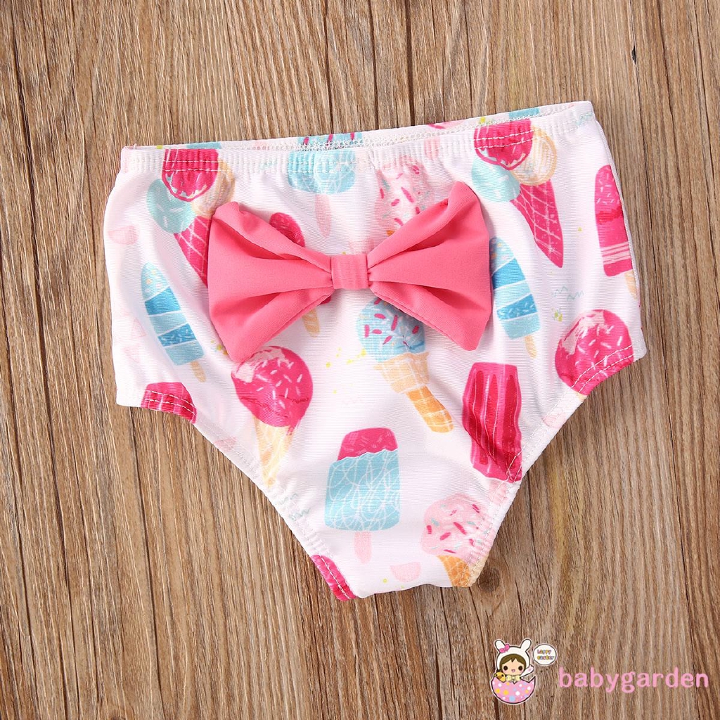 Set đồ bơi gồm áo yếm và quần short in hình que kem xinh xắn cho bé gái