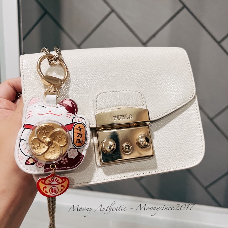 Móc khoá keychain charm Quý Mão 2023 mèo thần tài ôm vàng xoay siêu đẹp
