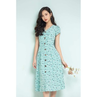 Váy hoa nền xanh ngọc khuy dừa
