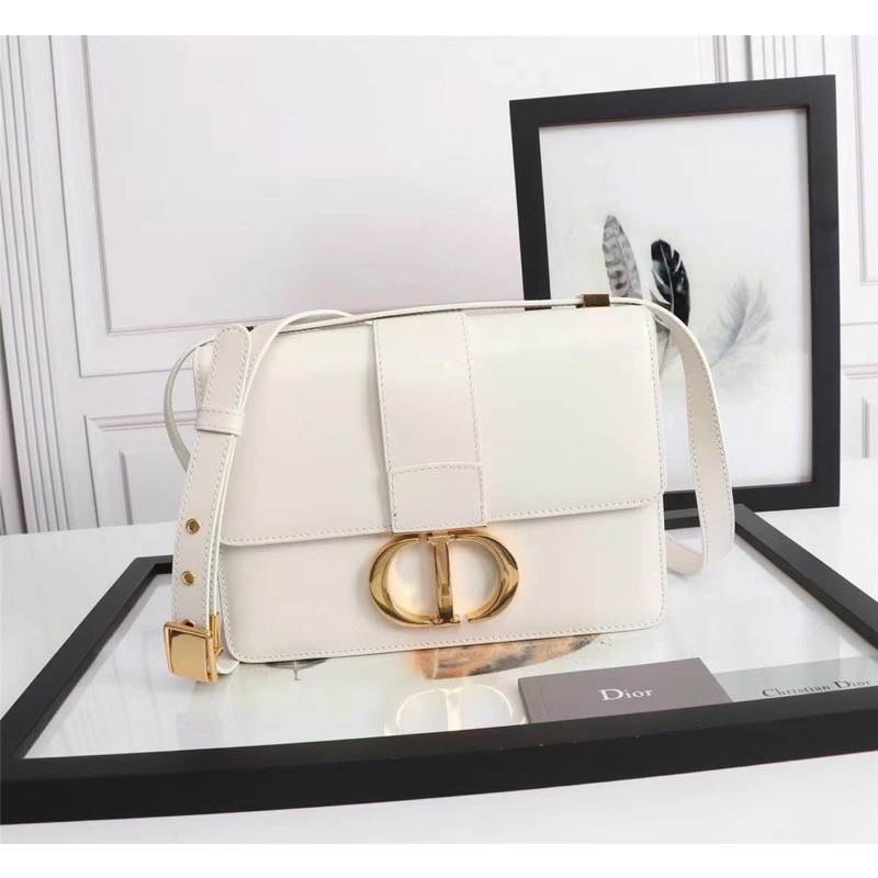 Túi trắng khoá vàng da trơn