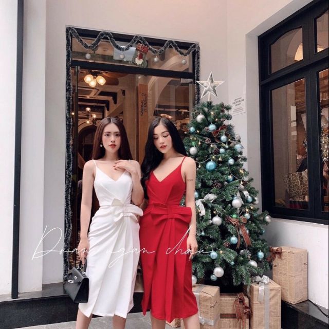 Đầm trắng,đỏ xếp li bên đính nơ