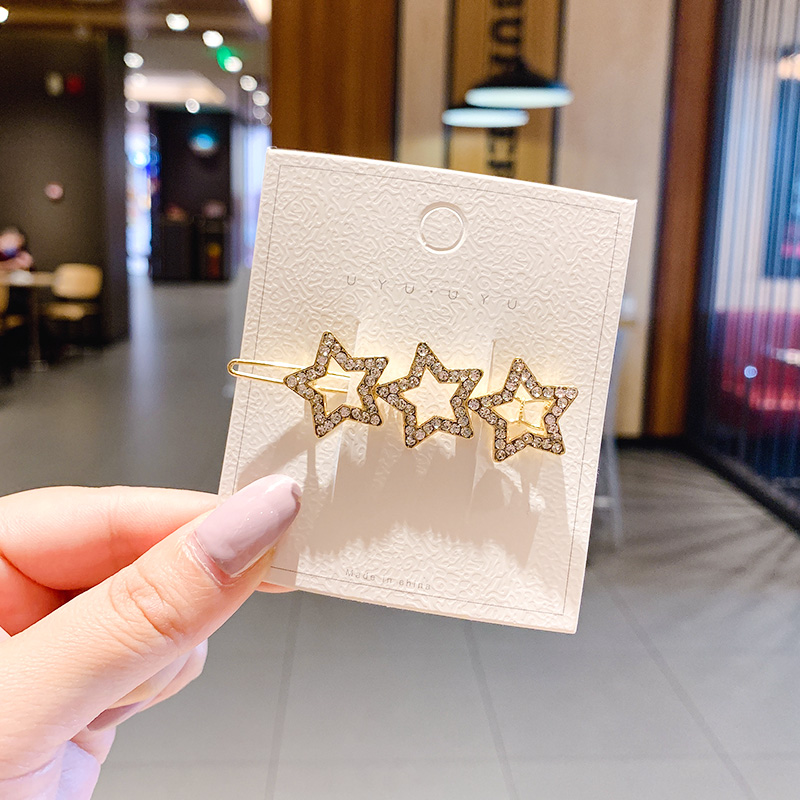 Kẹp tóc đính đá hình ngôi sao xinh xắn dành cho nữ