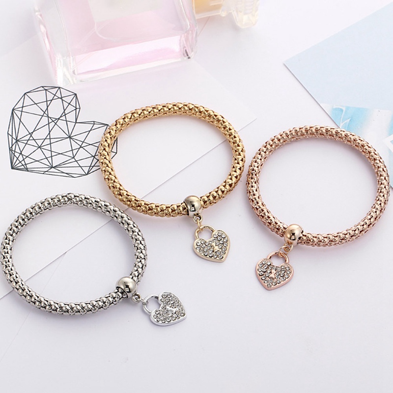 Set 3 vòng đeo tay hạt charm hình trái tim đính đá màu vàng/bạc dành cho nữ