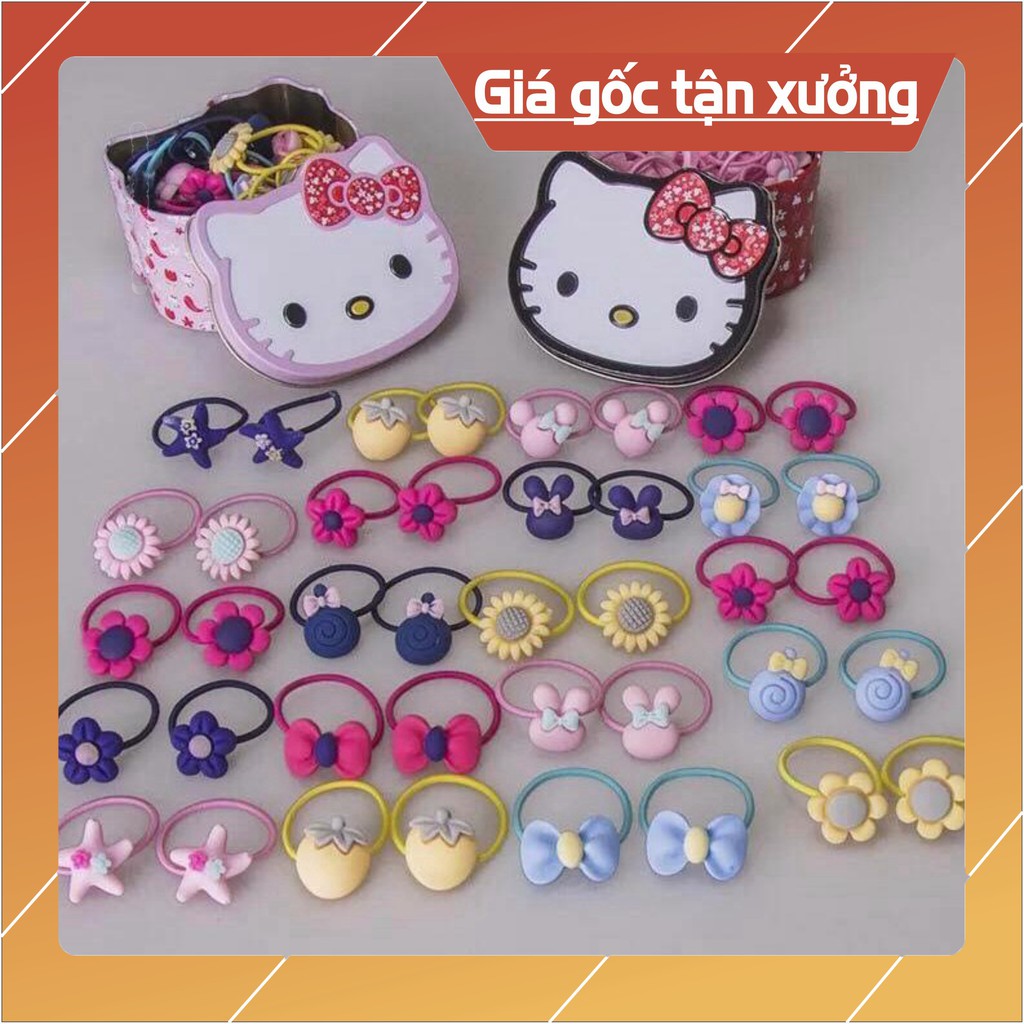 Sẵn hàng combo 10 hộp chun buộc tóc sắt hình Hello Kitty .