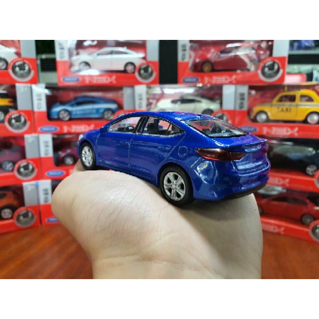 HỘP XE MÔ HÌNH Hyundai Elantra WELLY 1:36 (Xanh)