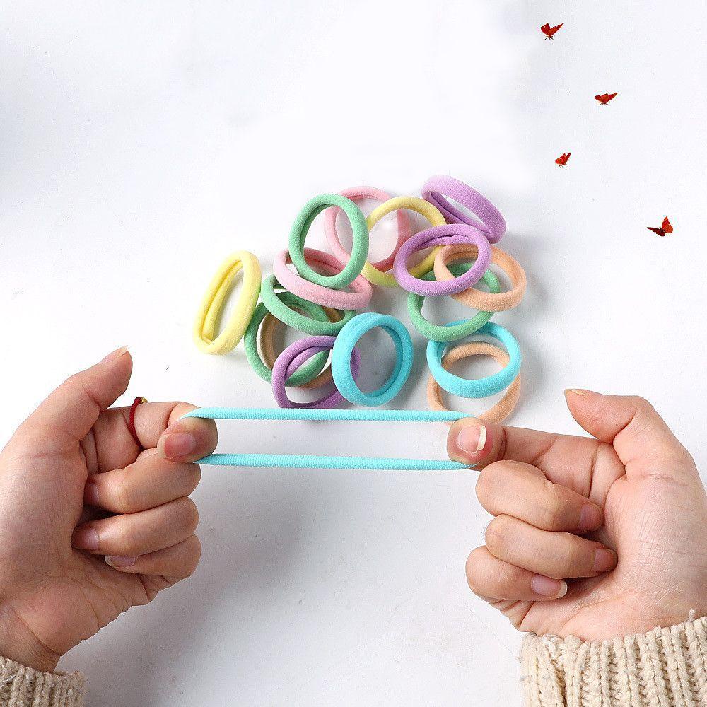 Hộp 20 Dây Buộc Tóc Cao Su Mềm Co Giãn Nhiều Màu Sắc Cho Bé Gái