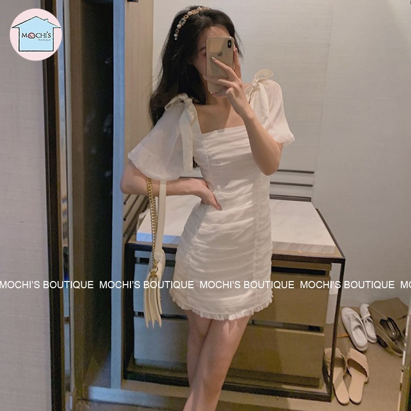 Đầm body dáng ngắn màu trắng nhún eo che khuyết điểm, mẫu váy đầm trắng cổ vuông tay phồng thắt nơ điệu đà-M065