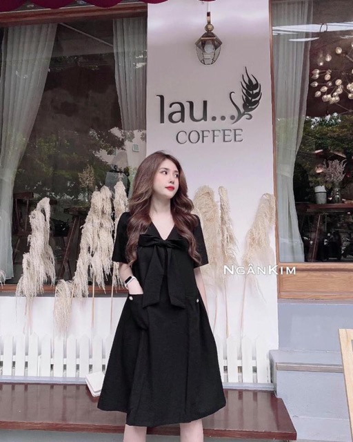 Váy suông đính nơ 2 túi xinh xắn 2 màu chất đũi