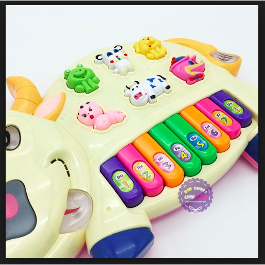 Đồ chơi đàn piano hình chú bò sữa