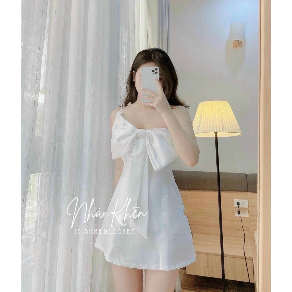 Đầm 2 dây mini trắng nơ ngực to
