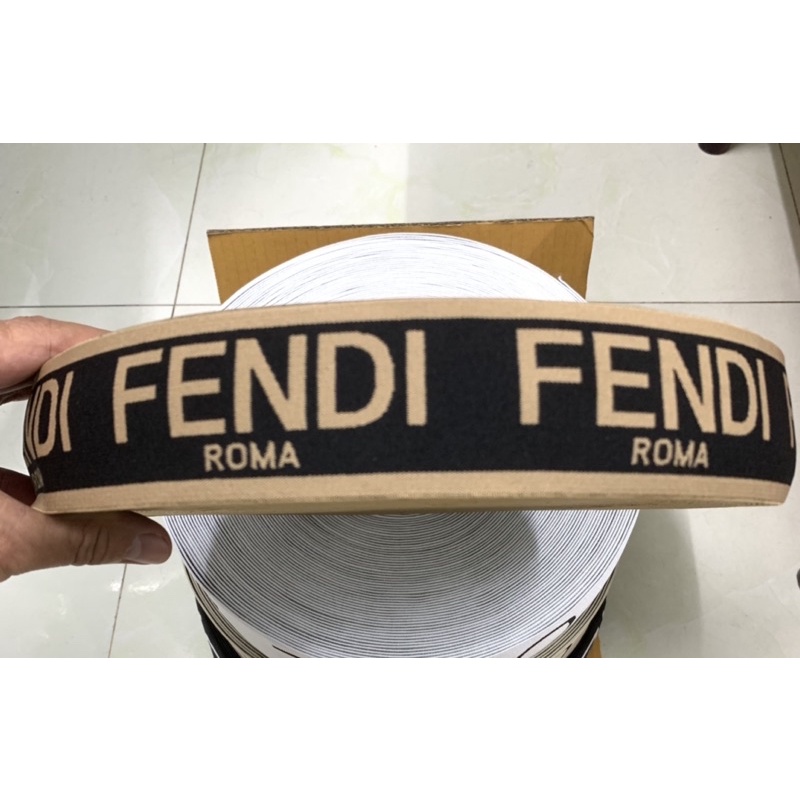 Thun dệt chữ may lưng quần 5cm.