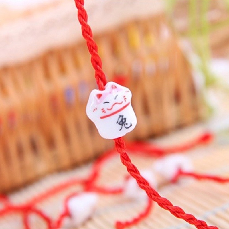 Vòng tay chỉ đỏ mix mèo thần tài gốm may mắn và xinh xắn