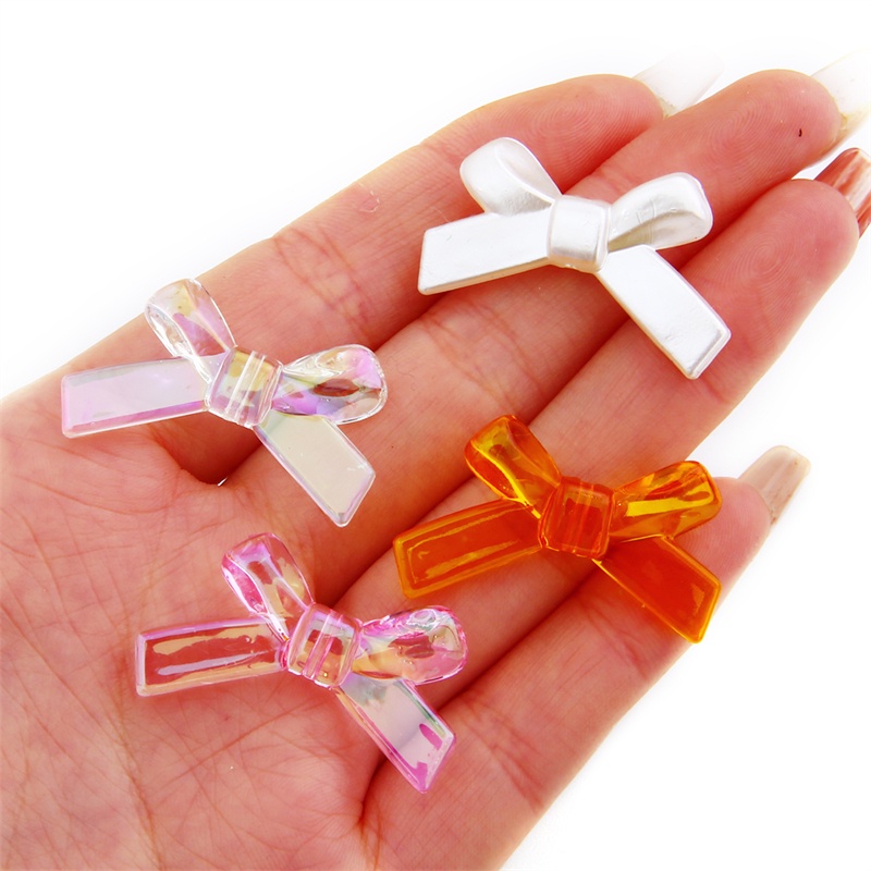 Set 4 hạt acrylic trong suốt hình nơ 34x20mm dùng làm trang sức thủ công
