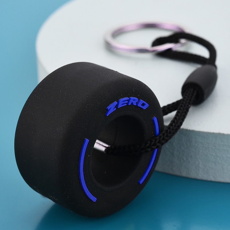 Móc khóa độc đáo hình chiếc bánh xe công thức 1 chất liệu cao su đàn hồi phong cách bền đẹp.4H