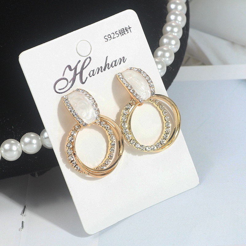 Đôi Khuyên Tai Dài Tua Rua Đính Đá Mắt Mèo Phong Cách Hong Kong Sáng Tạo Thời Trang