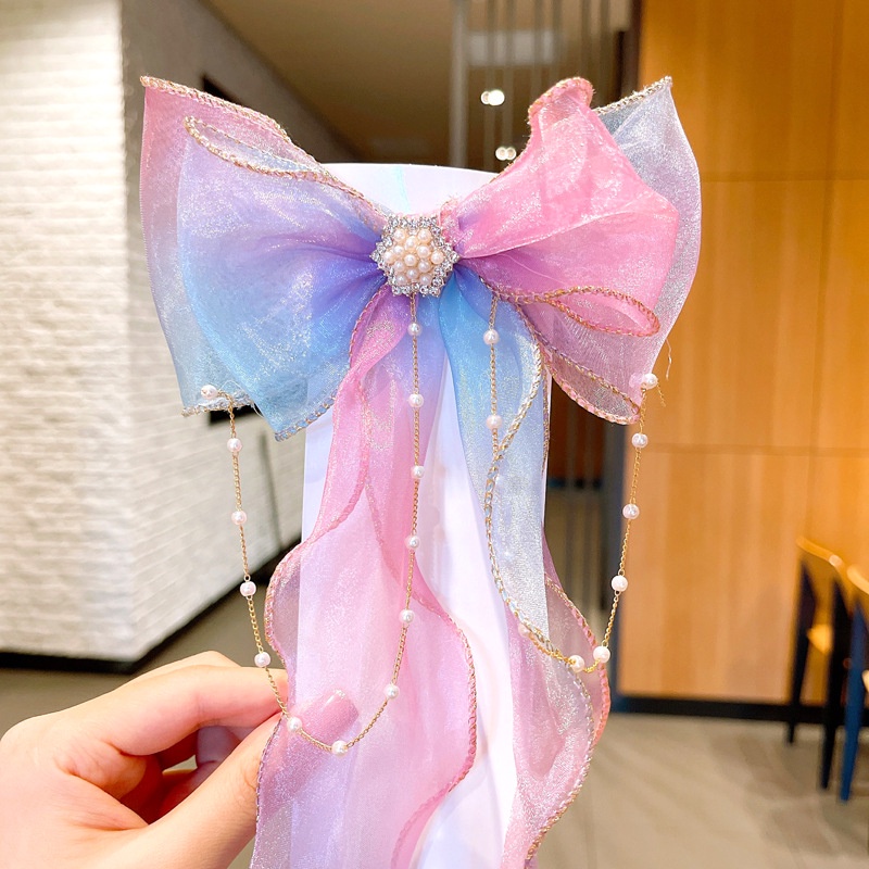 Kẹp tóc mặt hình nơ họa tiết hoa thời trang cho bé gái