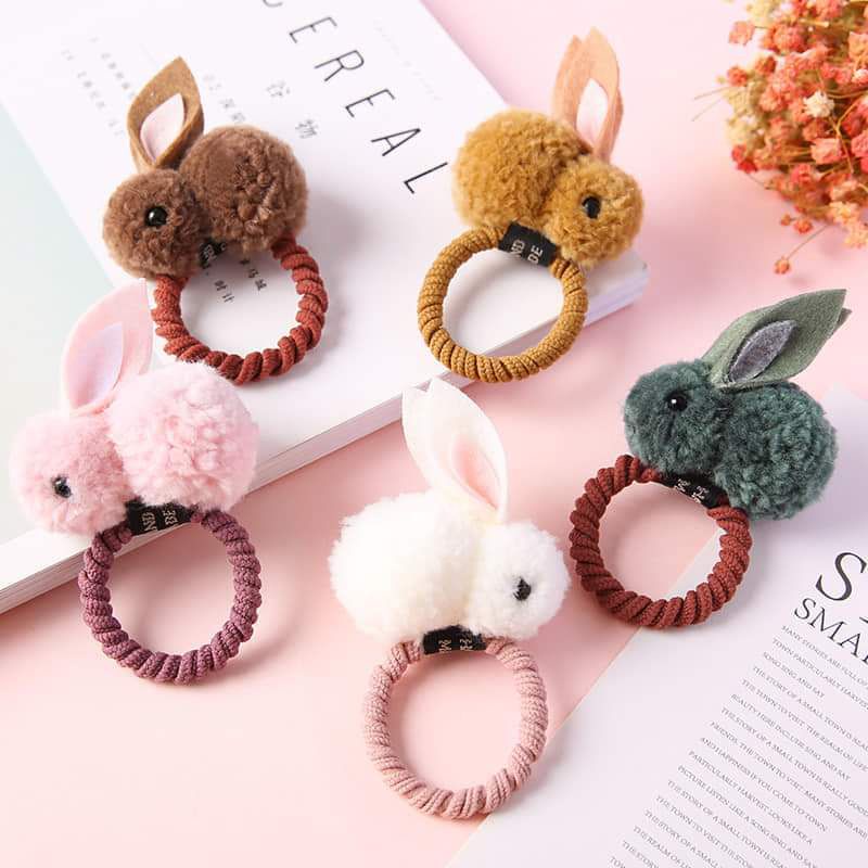 Cột tóc hình thỏ,,,