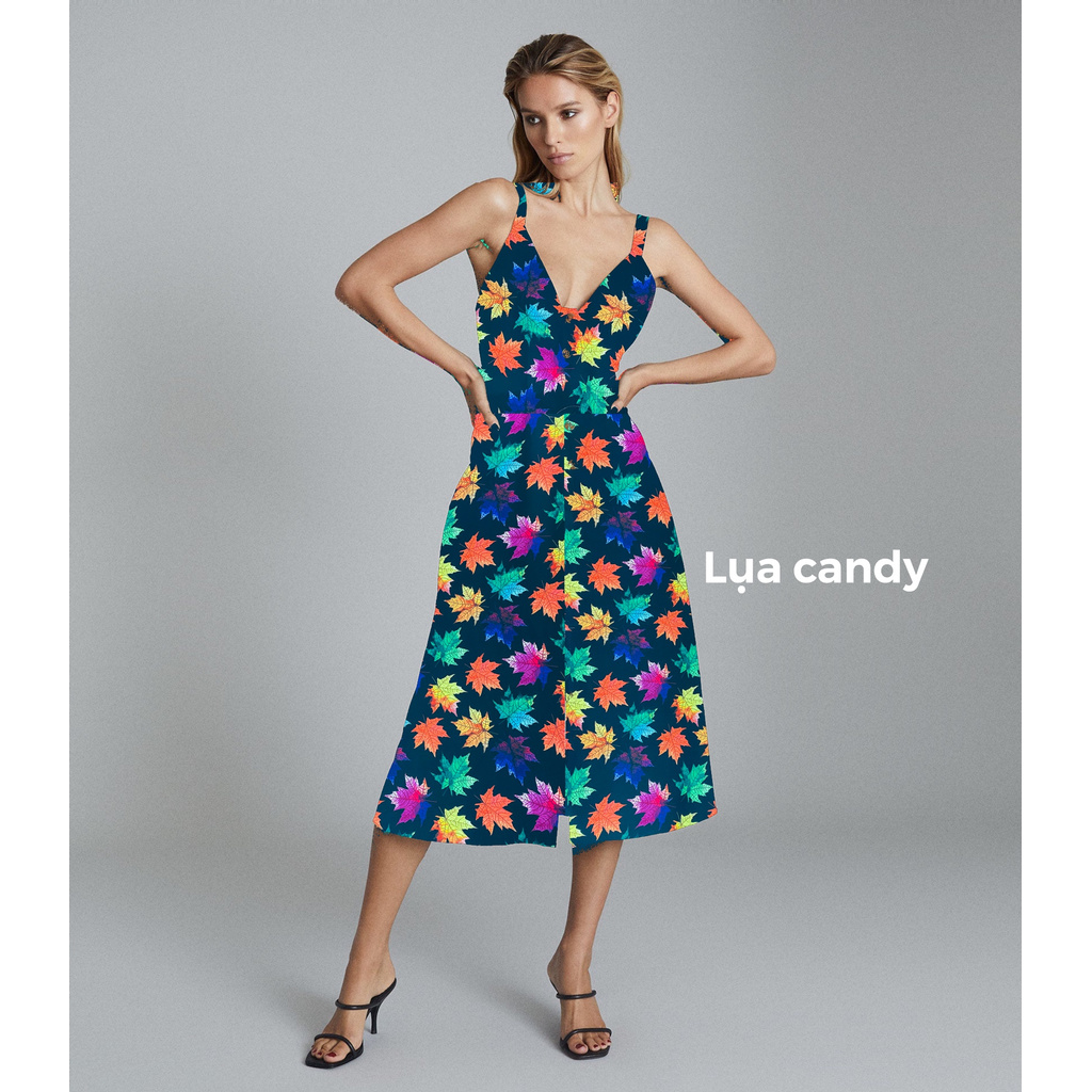 Vải lụa Candy may đầm xòe nền đen in lá nhiều màu MS1671