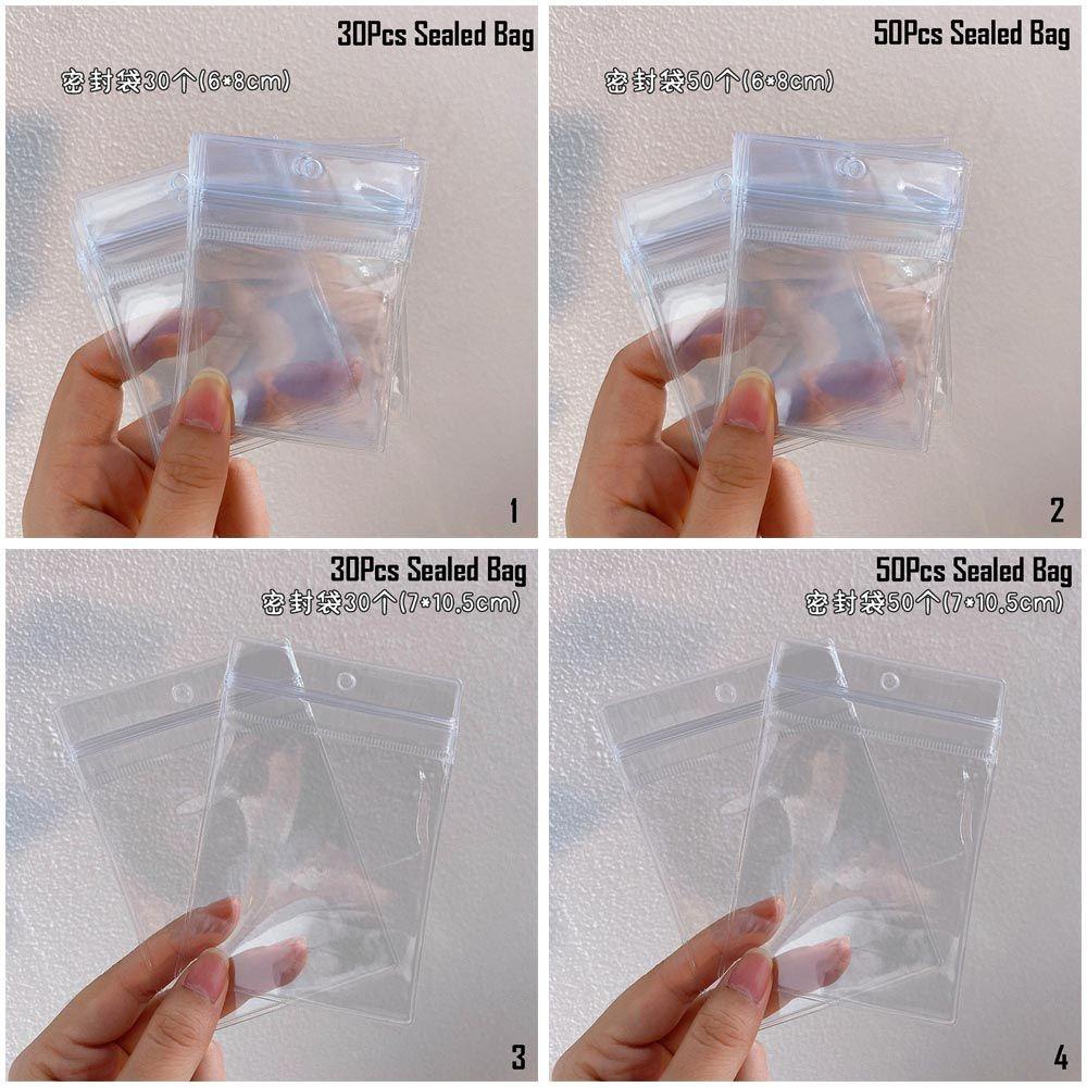 Sổ Đựng Trang Sức Trong Suốt Có Khóa Kéo Tiện Dụng