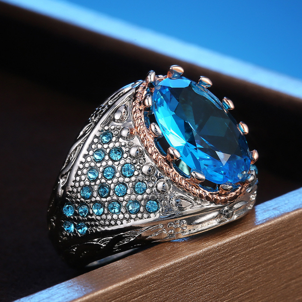 Nhẫn titan mạ vàng đính đá sapphire màu xanh lá thời trang