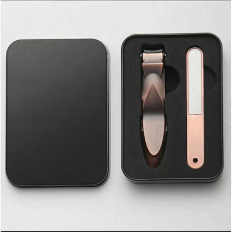 Bấm móng tay nguyên khối thép không gỉ có ngăn đựng móng và hộp