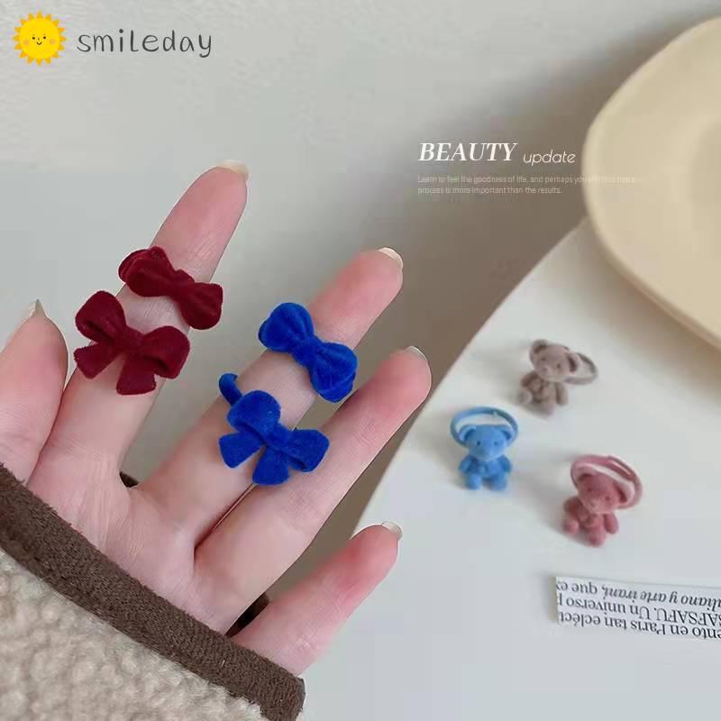 Set nhẫn đeo tay kim loại hình nơ xinh xắn cho nữ