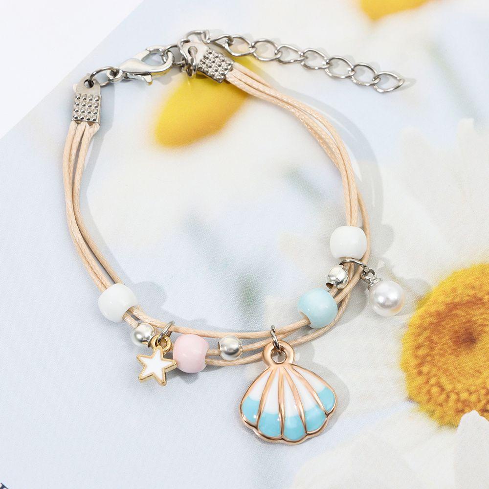 Vòng Tay Vỏ Sò Đan Tay Dễ Thương Cho Bạn Gái