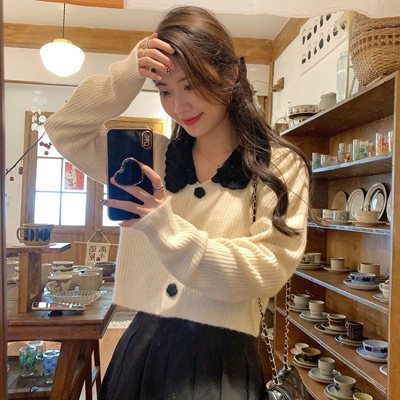 Áo khoác cardigan dệt kim tay dài dáng rộng màu tương phản thời trang thu đông mới cho nữ