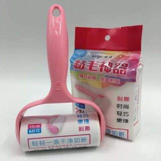 Cây lăn bụi quần áo tặng kèm 2 con lăn