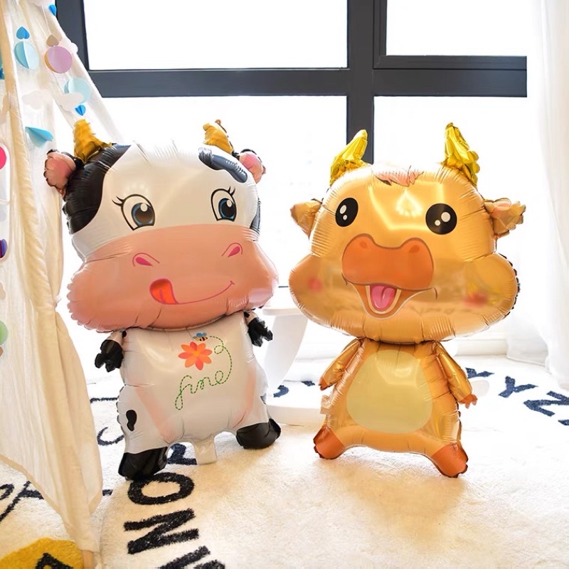 Bóng bay hình trâu vàng, bò sữa trang trí sinh nhật cho bé