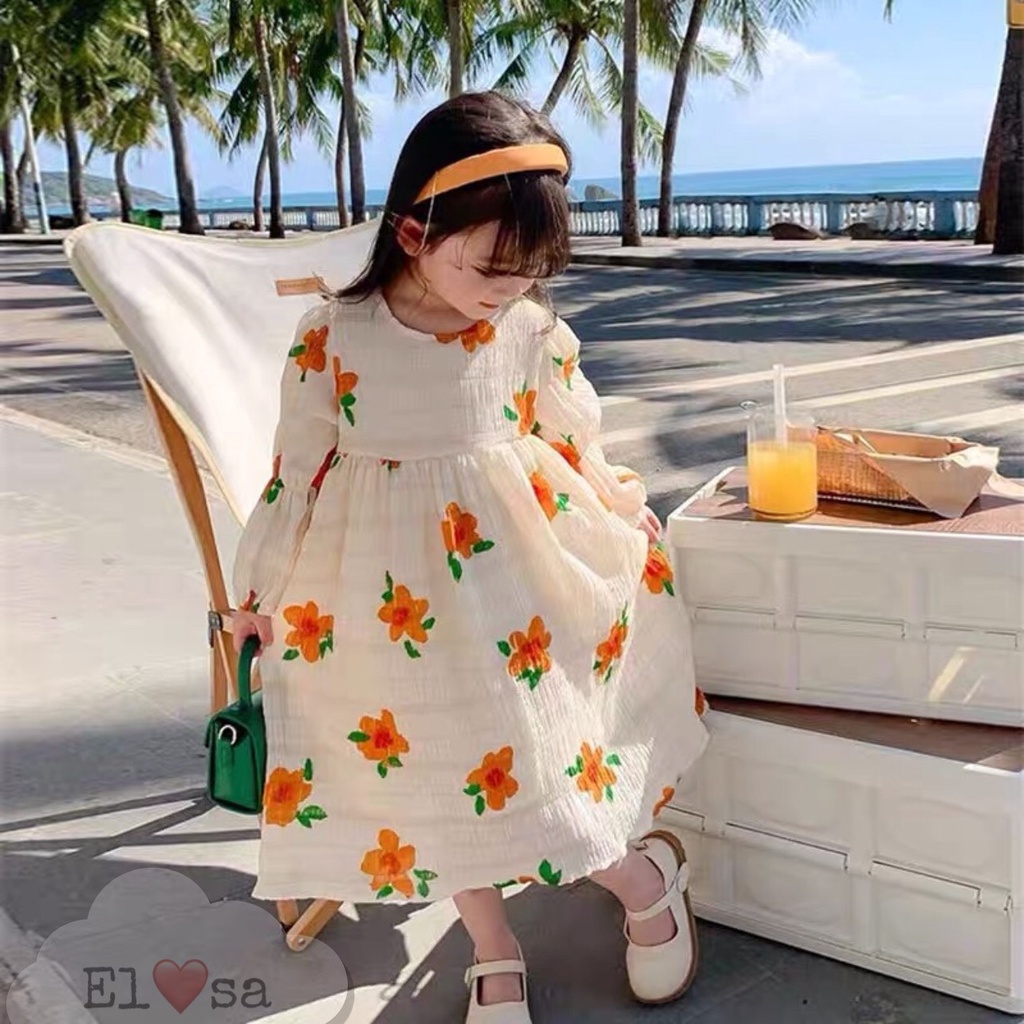 Váy bé gái hoa cam dài tay đũi mềm 8-30kg XHN1064