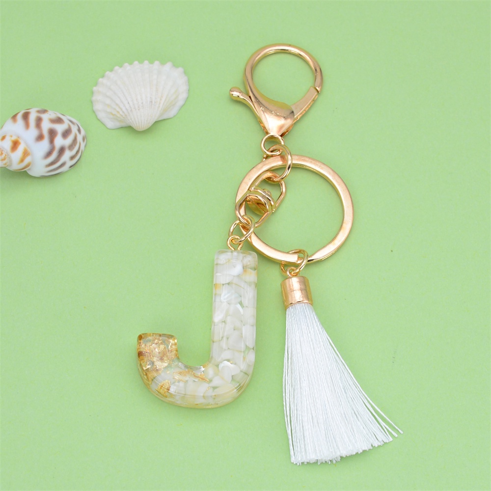 Móc Khóa Nhựa Resin Kim Tuyến Màu Vàng Gradient Phối Tua Rua In Chữ Cái Thời Trang Cho Nữ