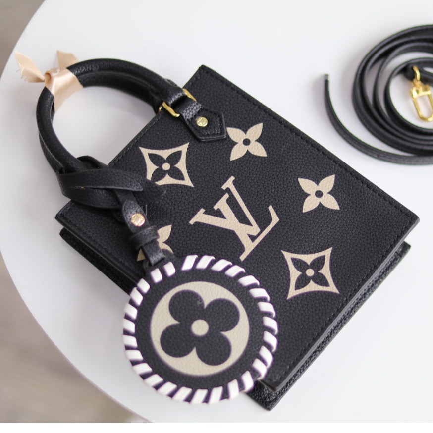 Túi xách QUẢNG CHÂU CAO CÂP Luôn Luôn Vui Tươi kèm móc tròn hot hit