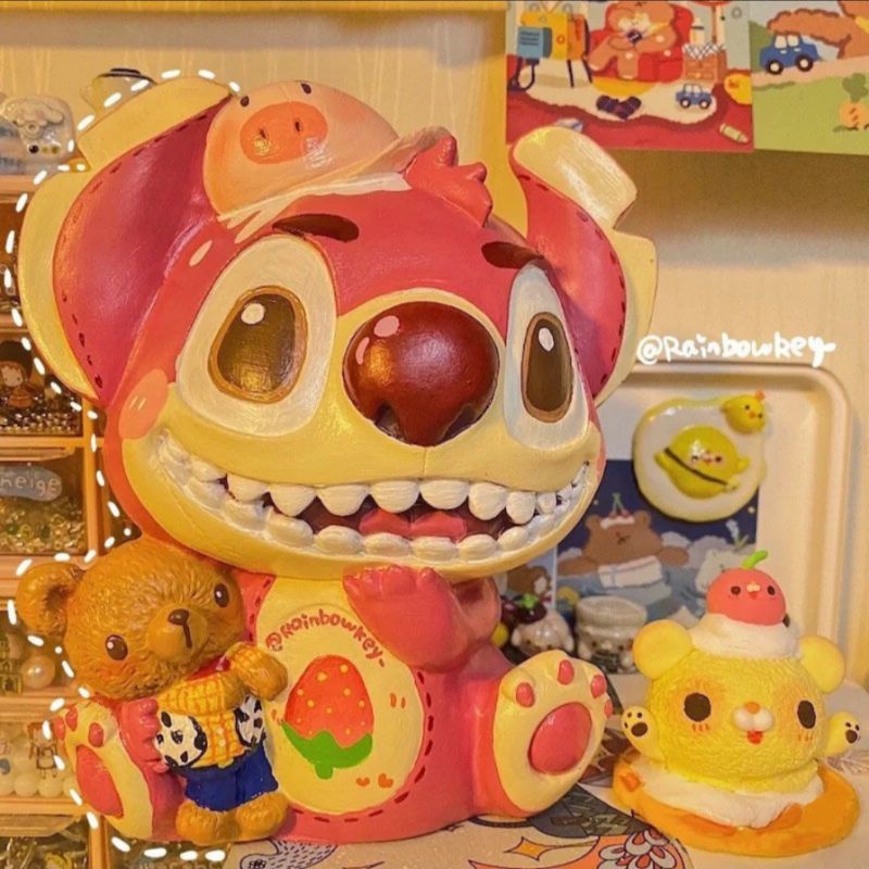 tượng thạch cao stitch ôm gấu