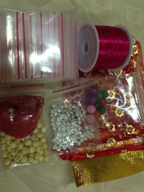 Combo 100hat dâu + 10( bi bạc, tui zip, đá, túi lộc, cước lụa, dây dù)