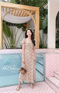 Đầm Hoa Nhún Ngực Xẻ Tà