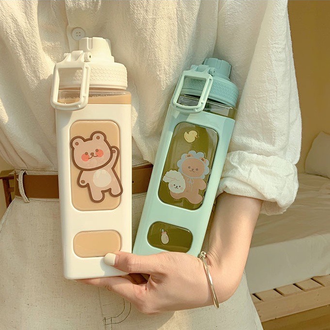 Bình Đựng Nước Nóng / Lạnh Bằng Nhựa Trong Suốt Có Tay Cầm Kích Thước 700Ml Màu Sắc