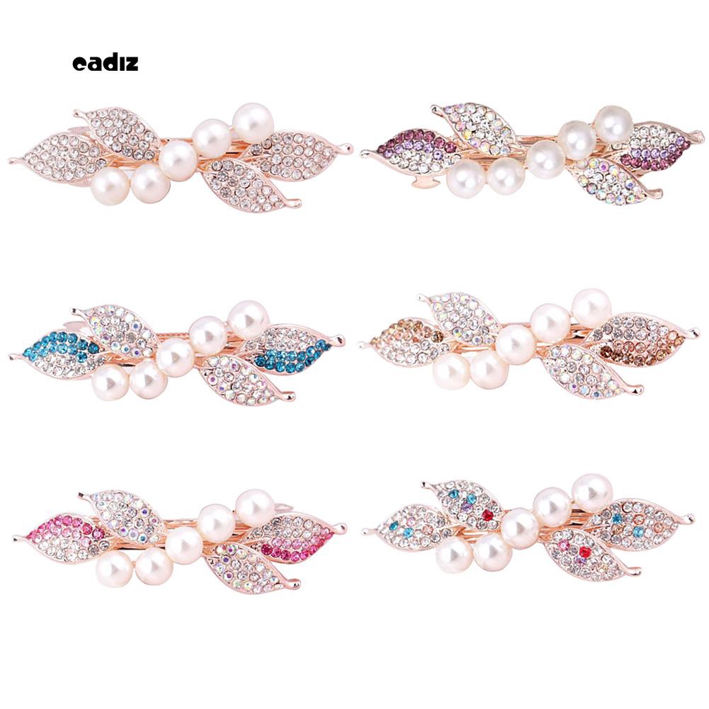 Kẹp tóc nơ đính hạt giả ngọc trai