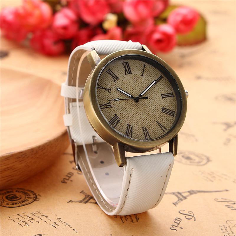 Đồng hồ analog máy quartz mặt số La Mã dây da thật