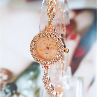 Đồng hồ lắc tay xi vàng
