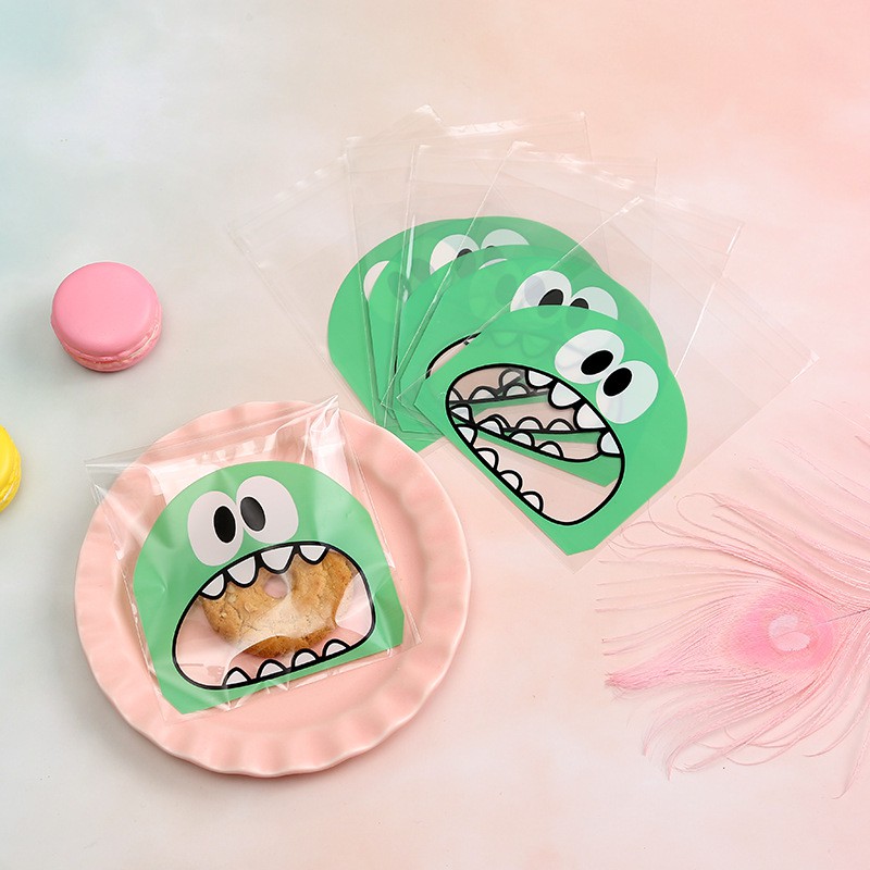 Set 100 túi nhựa đựng bánh kẹo in hình dễ thương