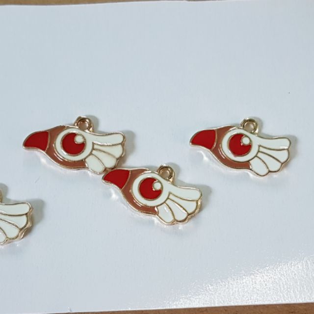 Mặt dây đầu chim ( gói 10 cái)