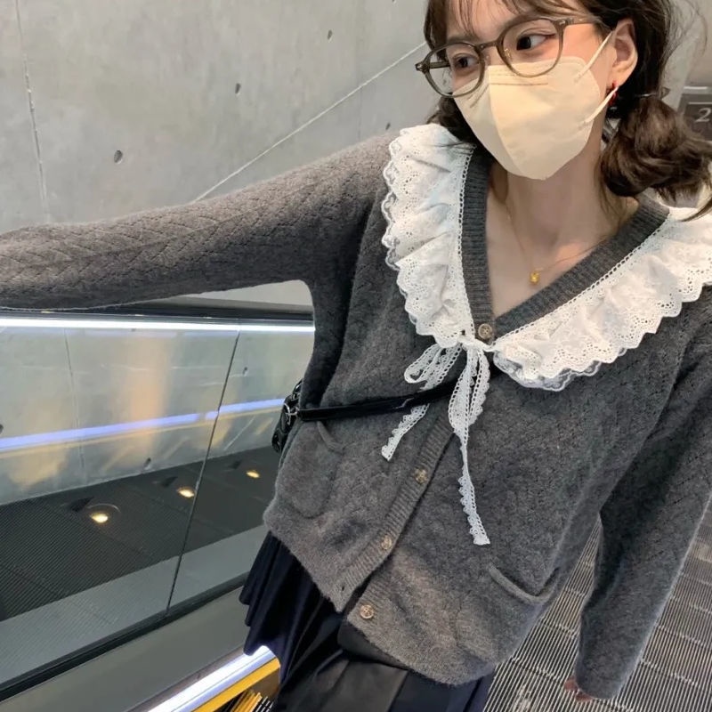 Áo khoác cardigan dệt kim dáng rộng phối ren thời trang thu đông cho nữ ins2021