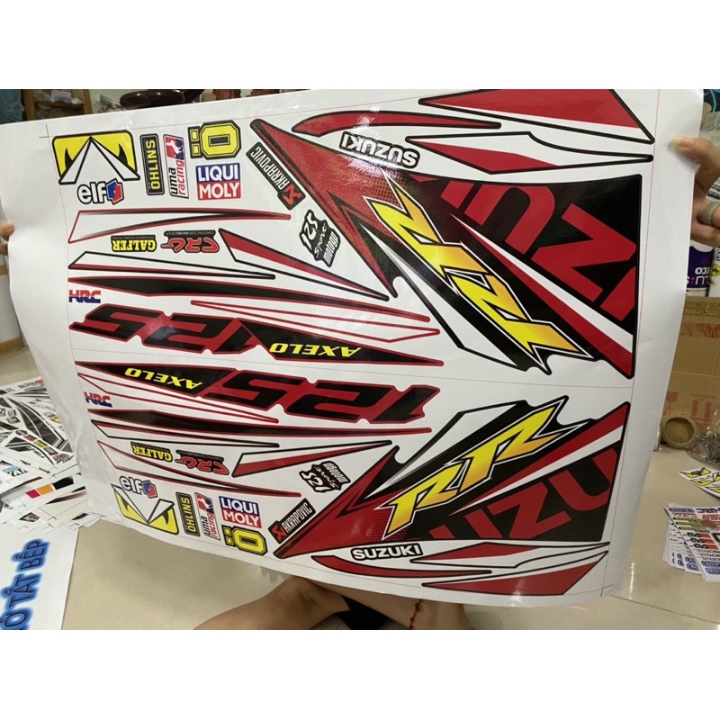 ( Quí khách vui lòng mang ra tiệm cho thợ dán ) Tem Axelo đỏ đen