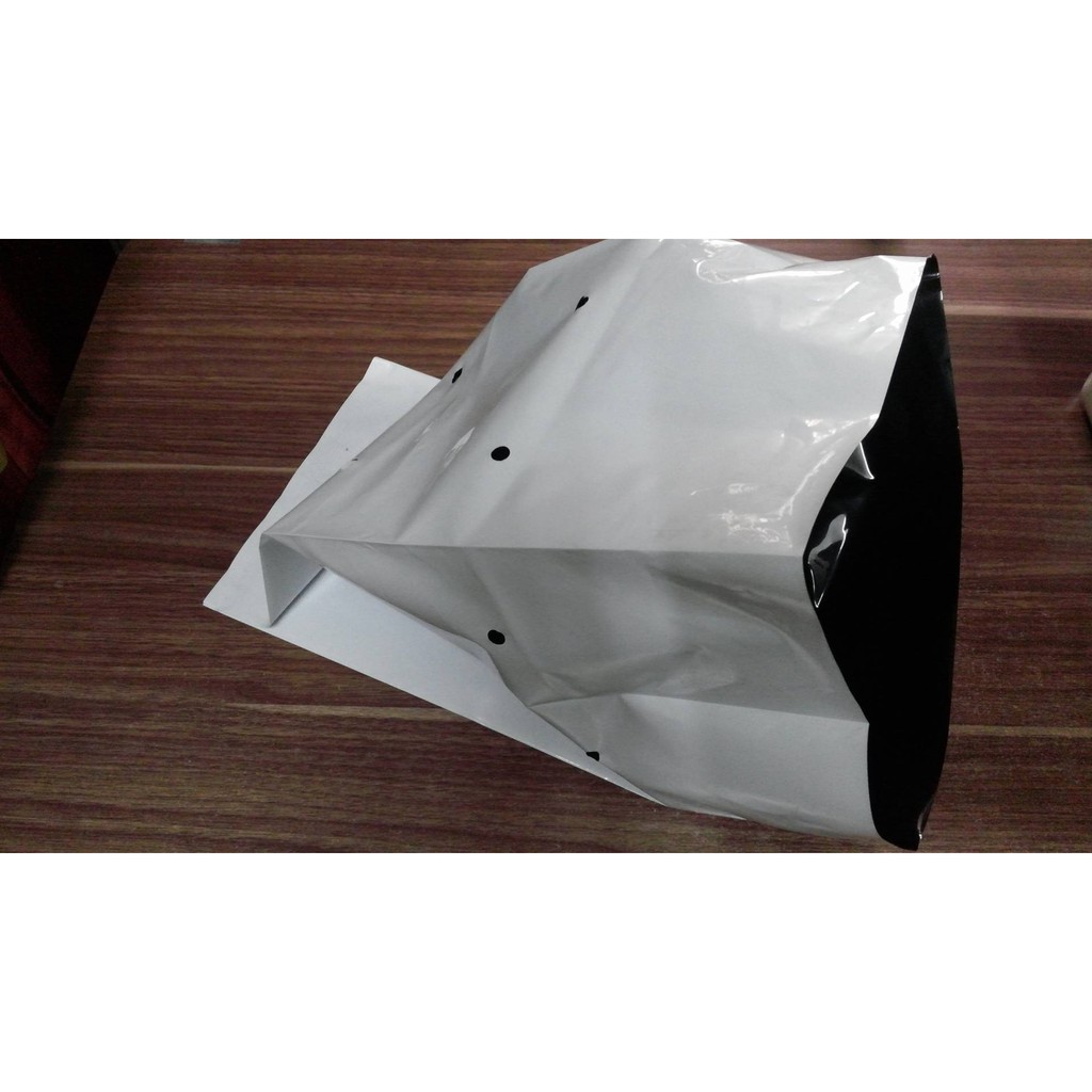 Túi nhựa PE đen trắng trồng dưa lưới, bầu bí tiện dụng KT 17x32 cm